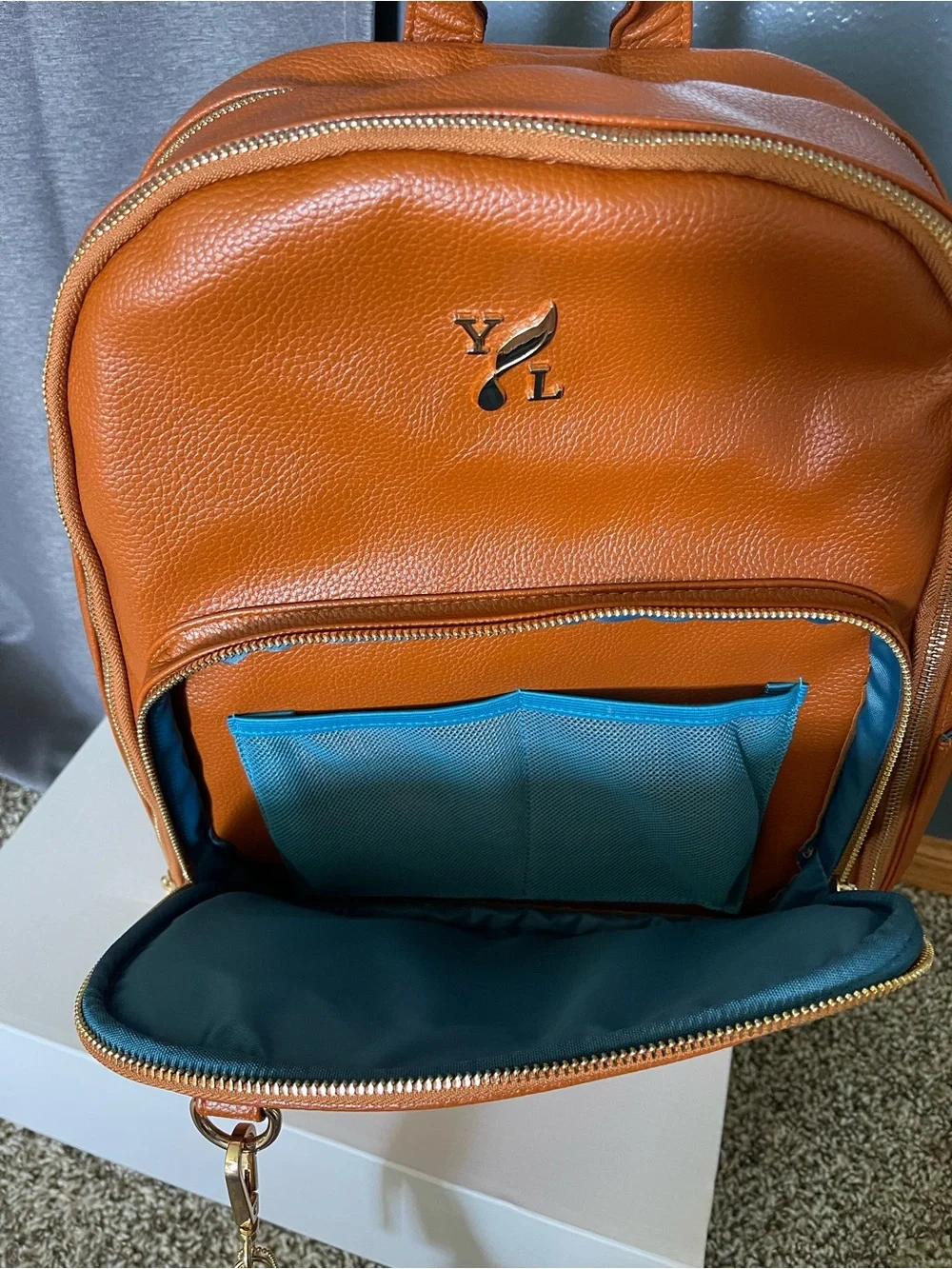 Young Living Cognac Brown Backpack with Tassel Charm